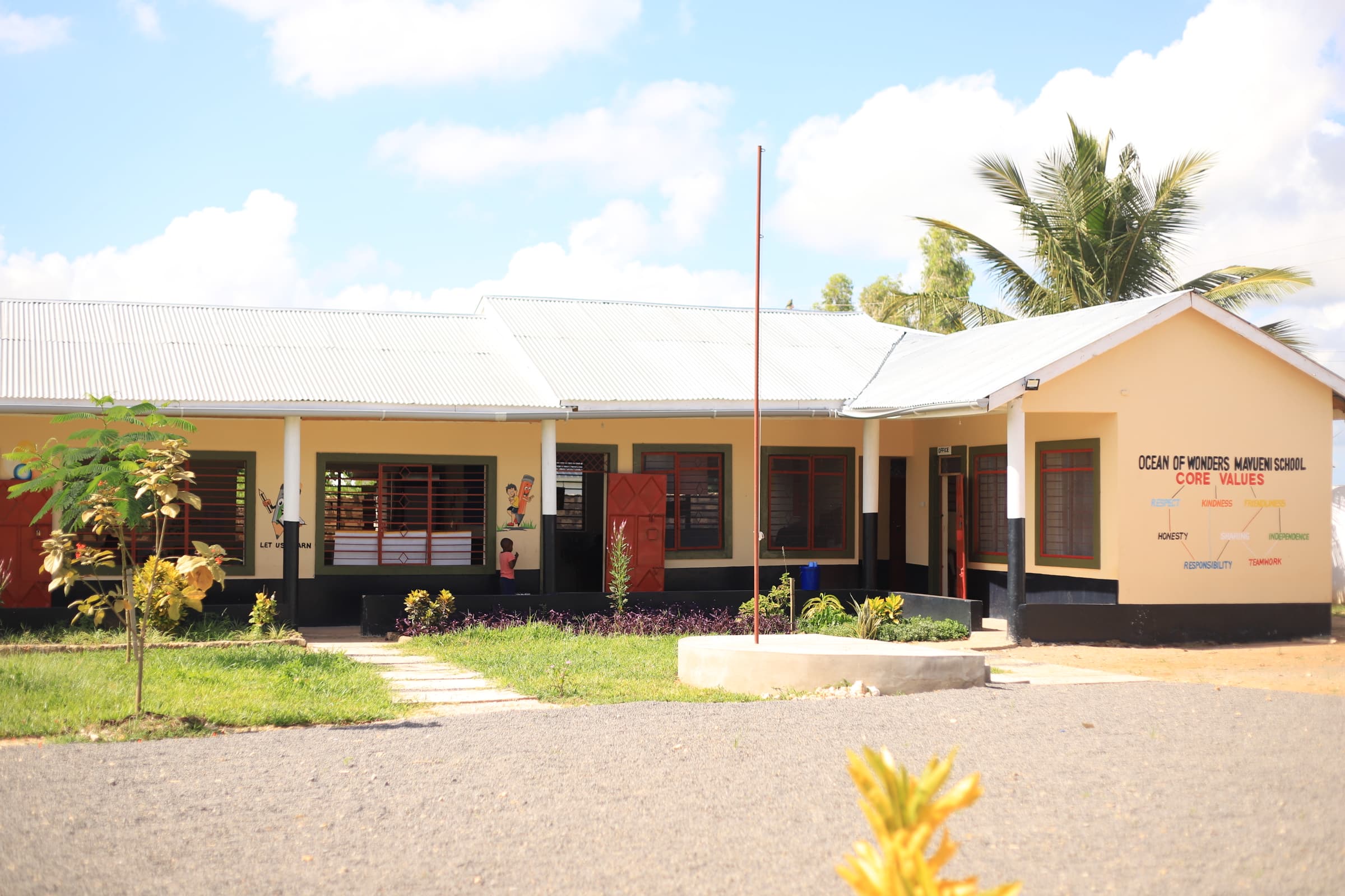 Friendly school office staff ready to welcome visitors