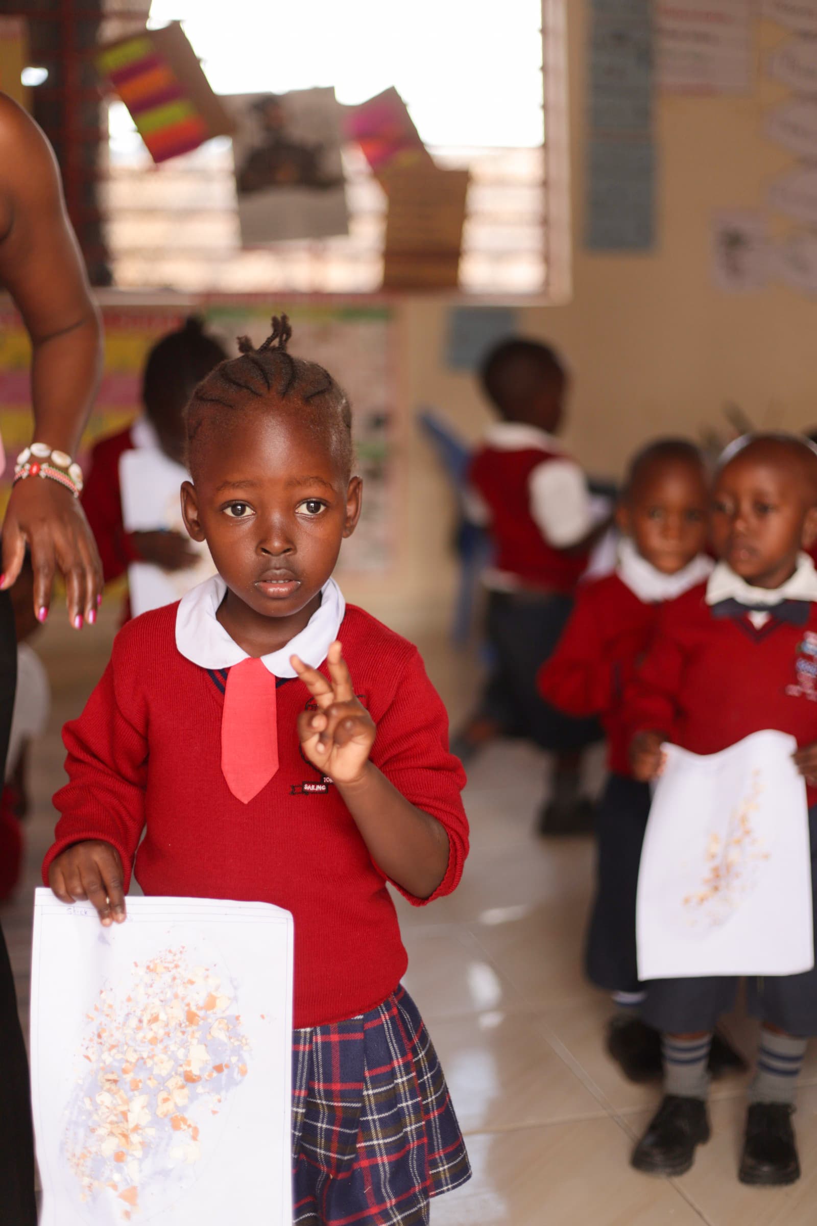 Child painting at art club